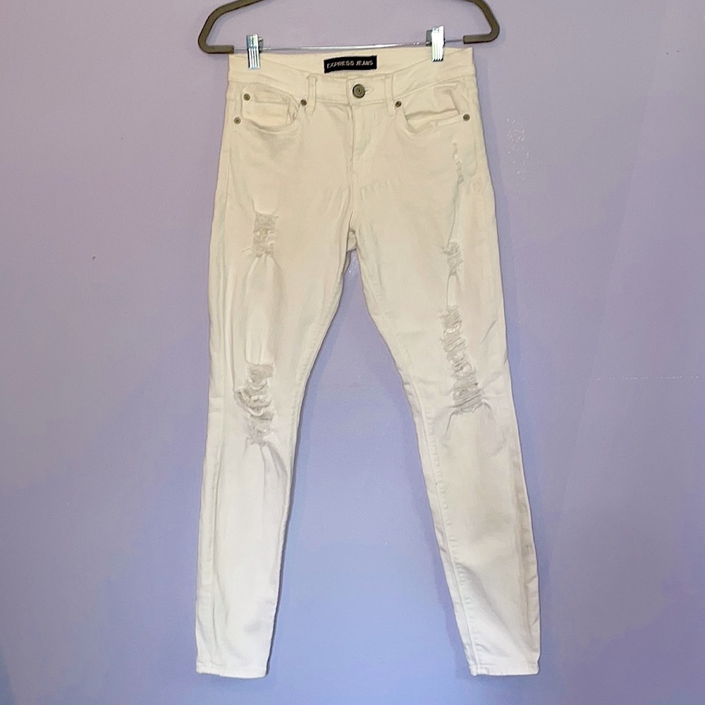 3/10$ White distressed Express jeans